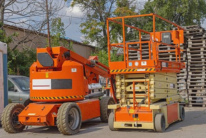 forklift truck transporting products in a warehouse in Arab